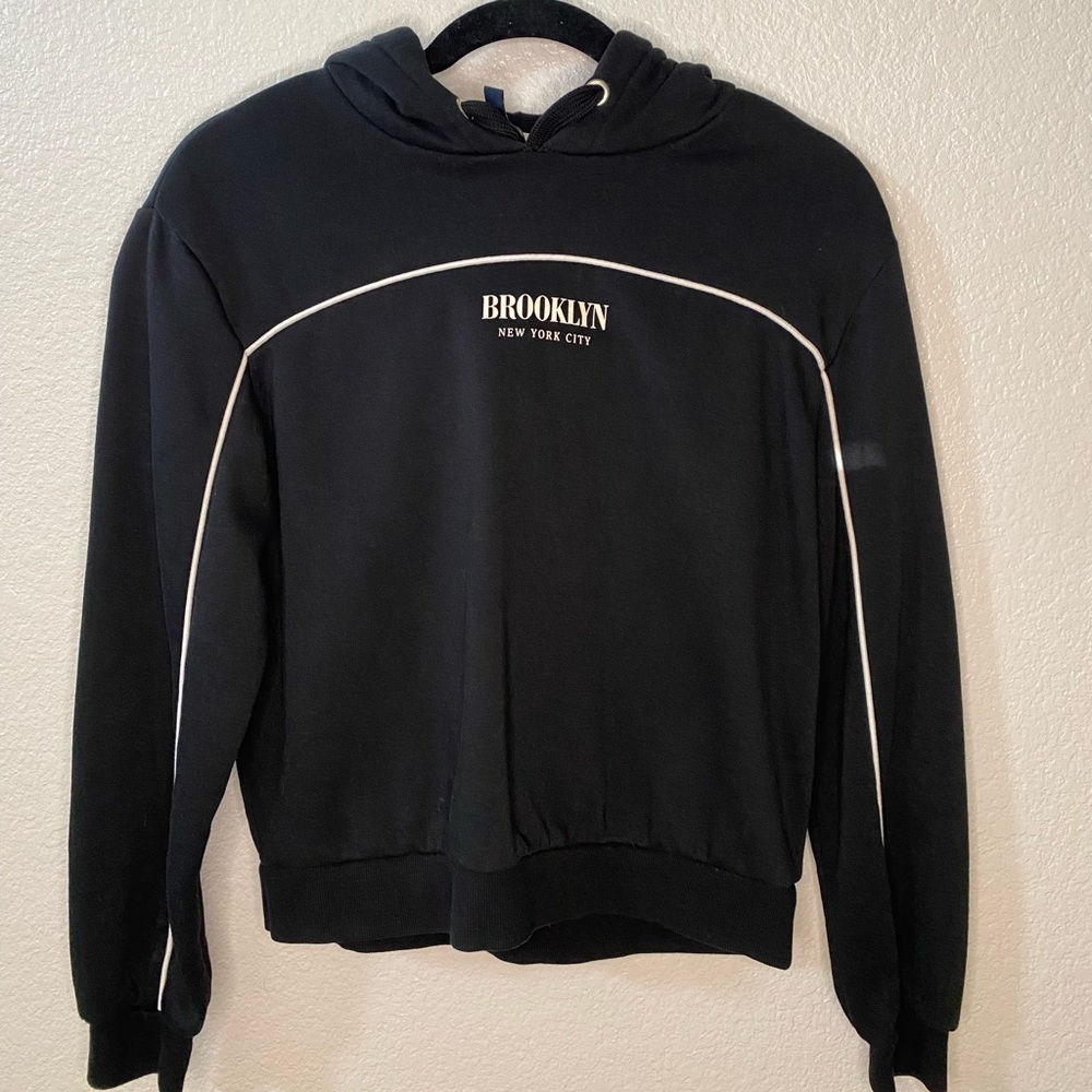 Black ‘Brooklyn New York City’ Hoodie from H&M.